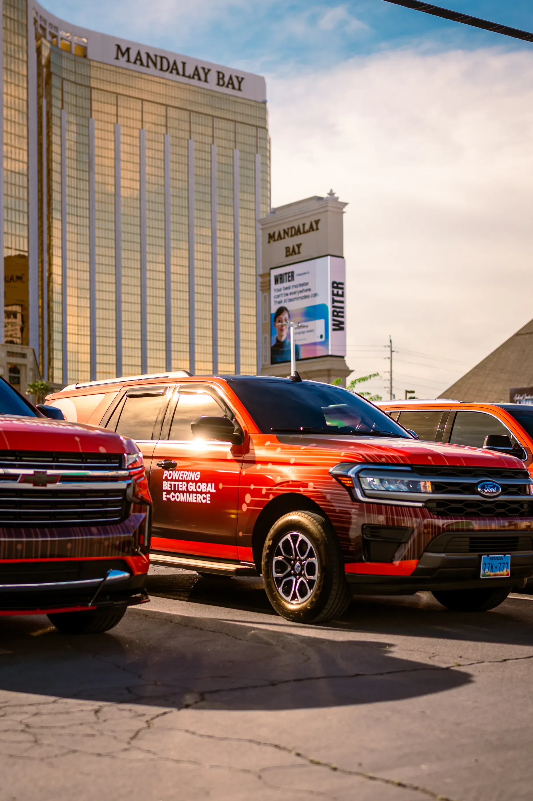 Red Globale-branded vehicle drives past hotels in Las Vegas.