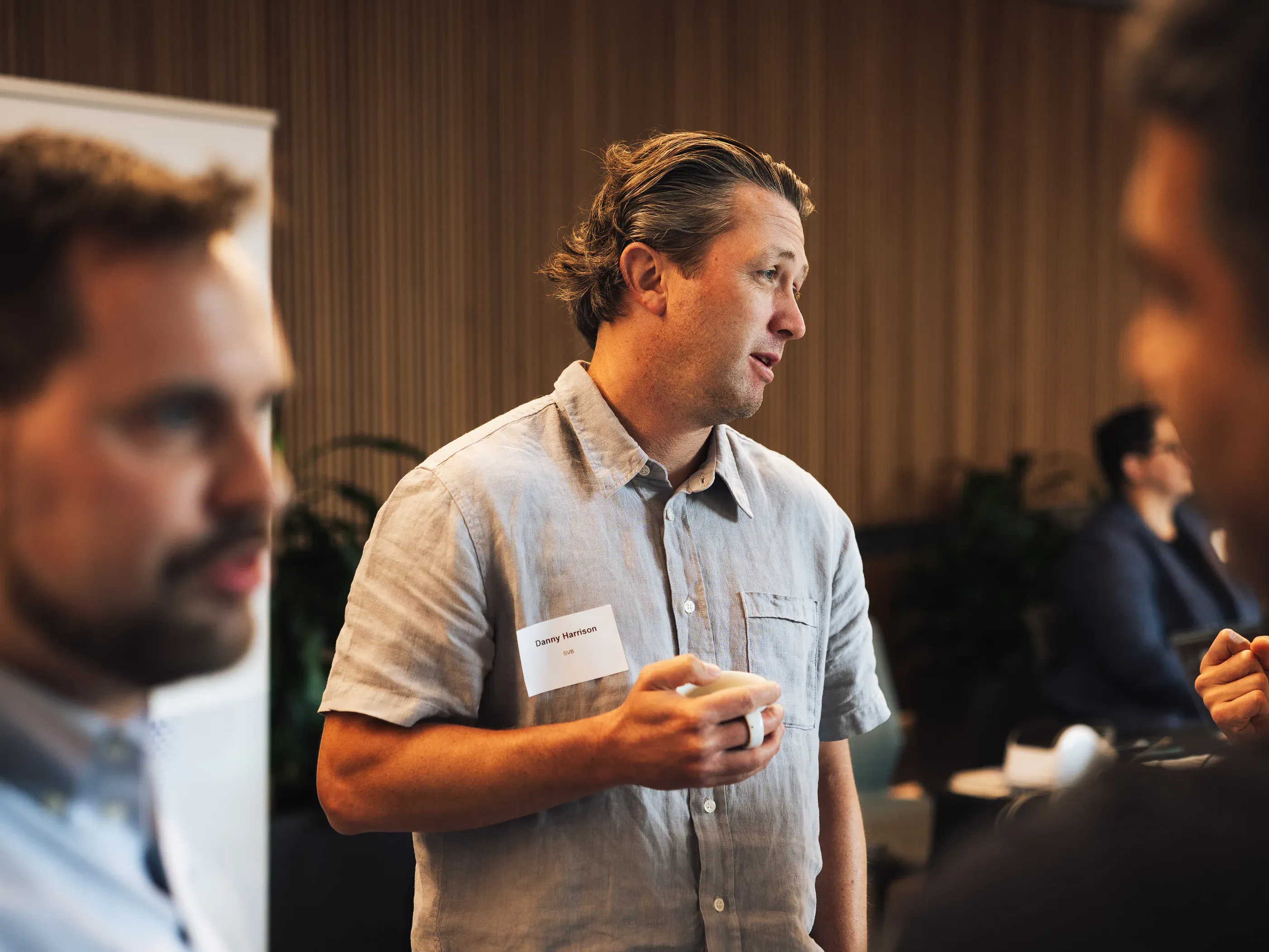 Guests talking during a networking session at a Seattle Tech Week event.